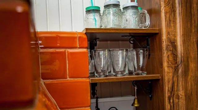 Glasses by the tiled stove – Gaja holiday home, Białowieża Forest